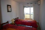 bedroom with sea views and acess to terrace